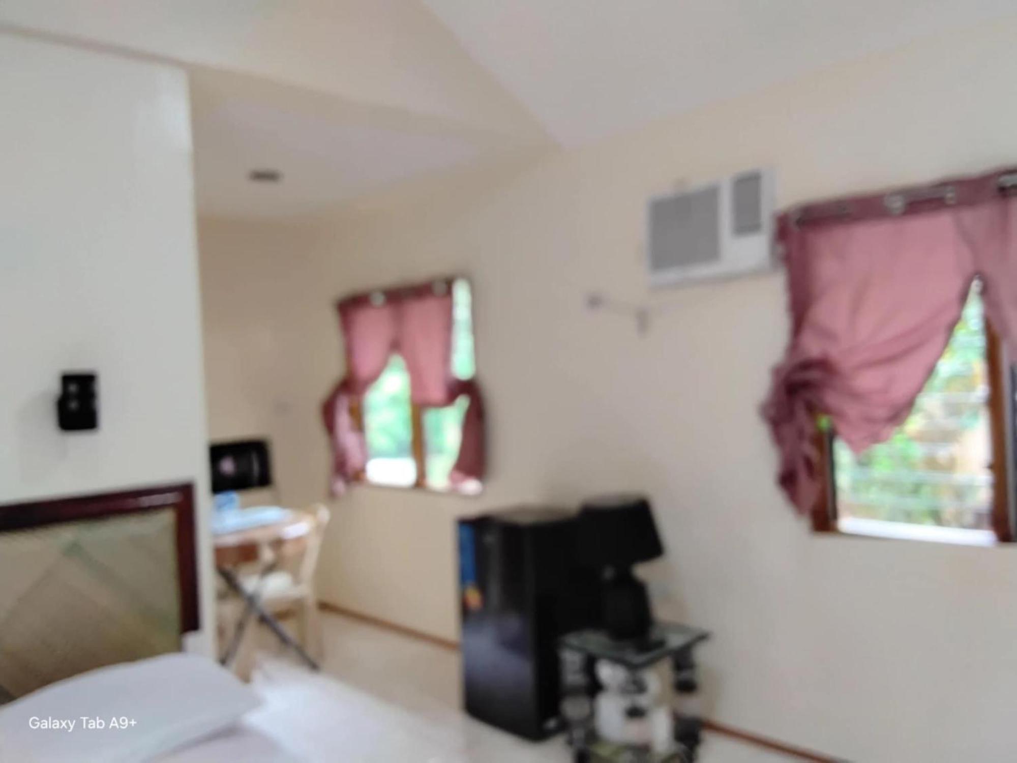 Camiguin Lanzones Resort Мамбахао Номер фото